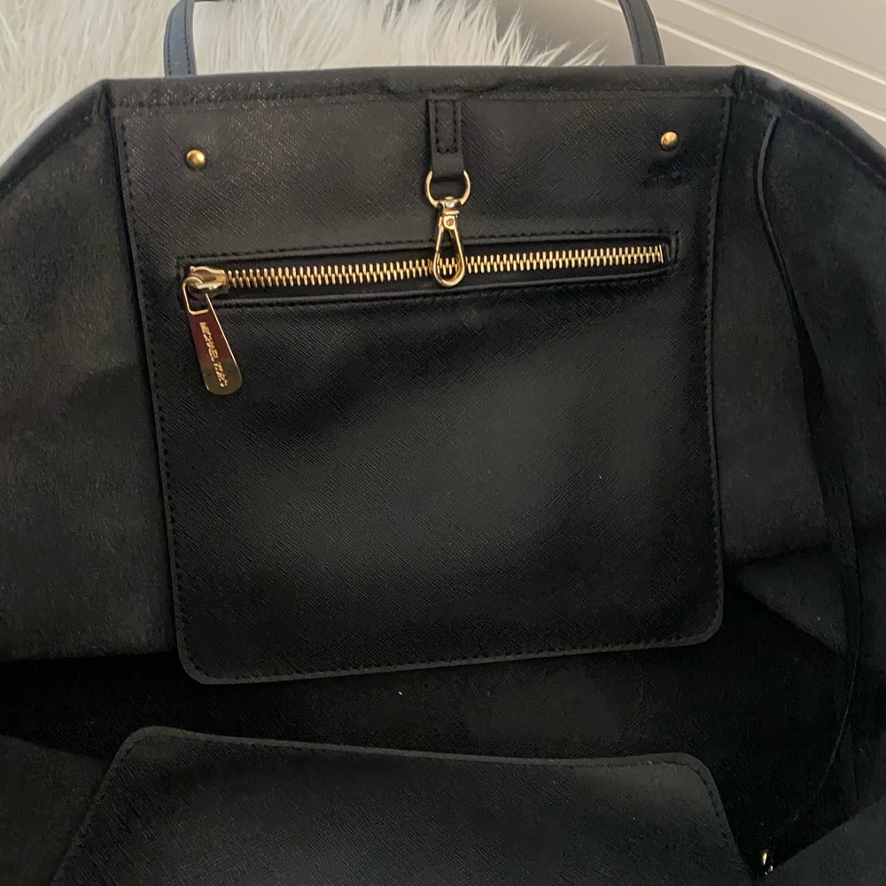 Black leather Michael Kors tote bag with gold-toned accents and flat handles. - Picture 9 of 12